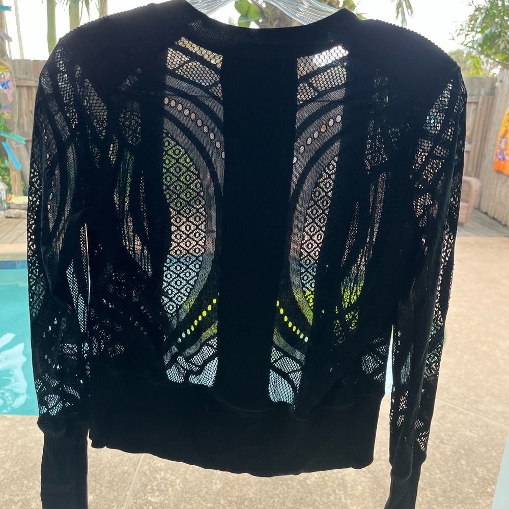 Elegant sweater detail. - it looks amazing when worn over just a cami or bra.